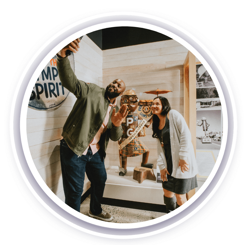 Two people looking at a museum exhibit