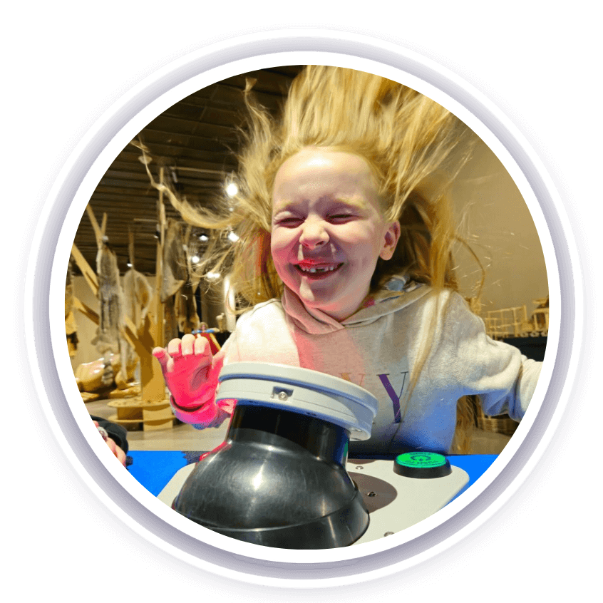 A blonde girl with air blowing in her face