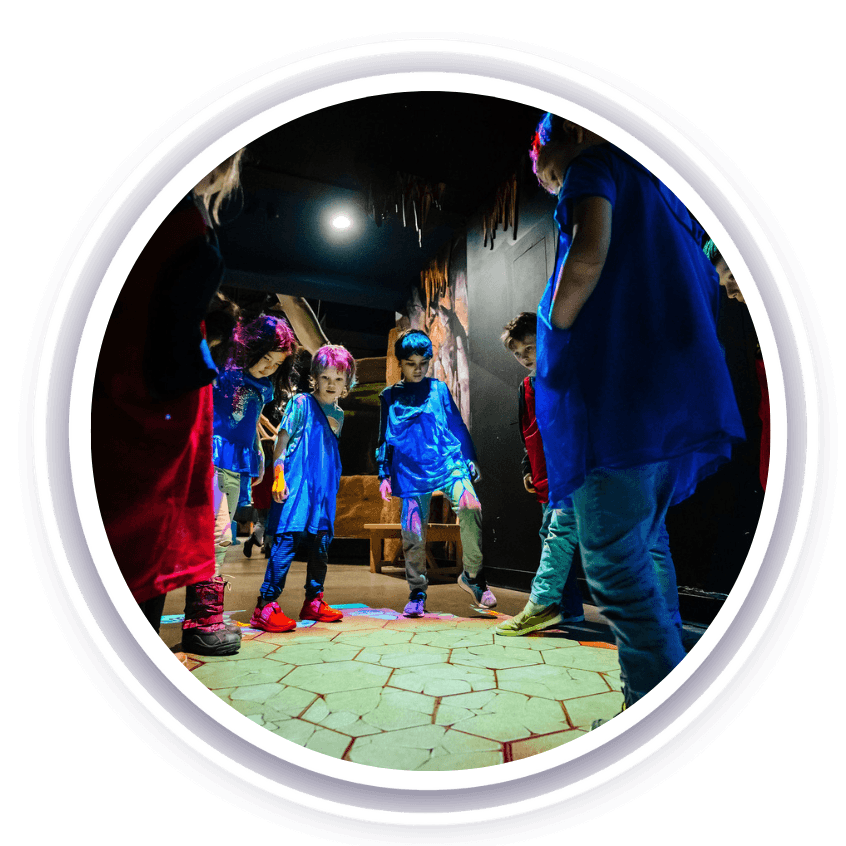 Children participating in an interactive activity at The Exploration Place